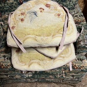 4 needlepoint chair cushions with ties.